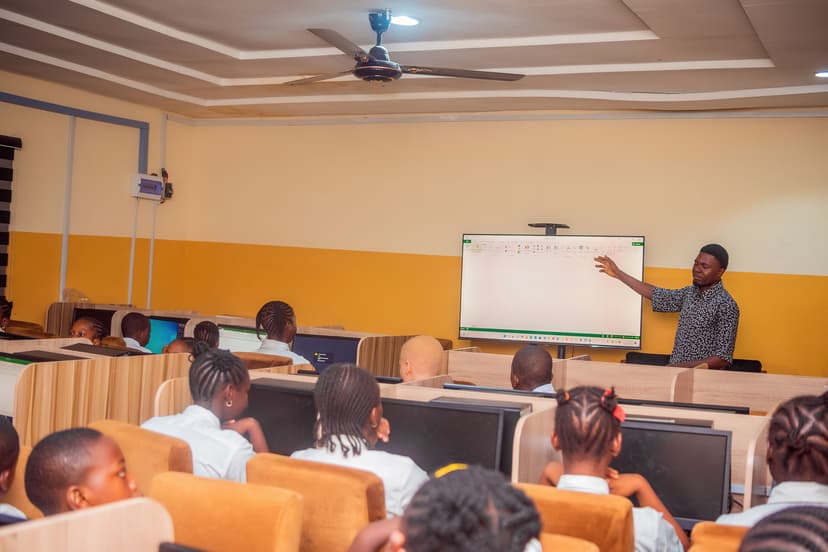 Teacher instructing on smartboard